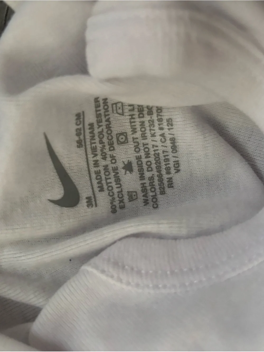 Nike White Baby Bodysuit with Gray Swoosh